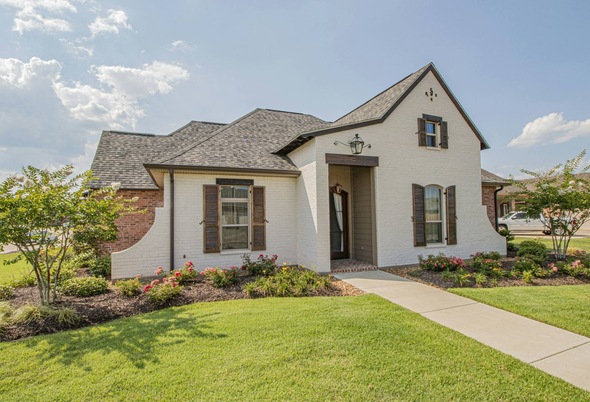 Well-maintained Lexington-area home with landscaped lawn and foundation suitable for radon testing and mitigation